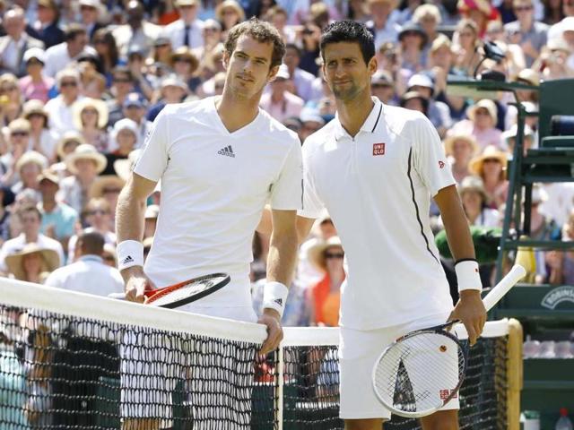 Andy Murray and Novak Djokovic pose for photographers before the Men's singles final match at the All England Lawn Tennis Championships in Wimbledon, London. AP