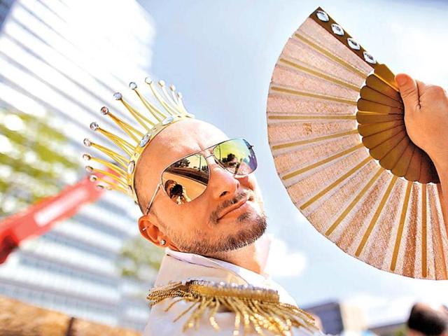 A reveller takes part in the Christopher Street Day parade in Cologne to demonstrate for the rights of all lesbian, gay, bisexual, transgender and transsexual people. Reuters