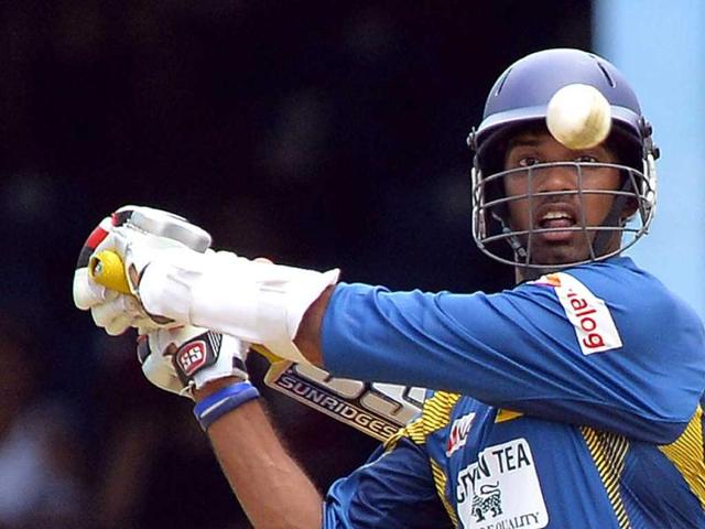Sri Lankan cricketer Sachithra Senanayake plays a shot during the fifth match of the Tri-Nation series between Sri Lanka and West Indies at the Queen's Park Oval stadium in Port of Spain. AFP Photo