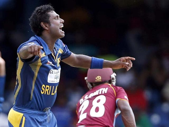 Sri Lanka's Angelo Mathews celebrates after trapping West Indies batsman Devon Smith LBW for a duck during their Tri-Nation Series cricket match in Port-of-Spain, Trinidad. AP Photo