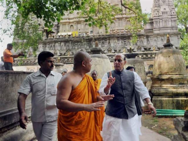 Bodhgaya: BJP president Rajnath Singh interacts with a priest during his visit to the Mahabodhi Temple at Bodhgaya on Tuesday, two days after the serial blasts. (PTI Photo)