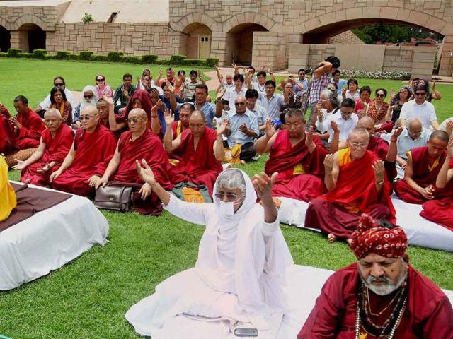 Buddhist Monks along with other religious leaders during an inter-faith prayer meeting following Sunday's serial blasts at Bodhgaya temple. (PTI Photo)