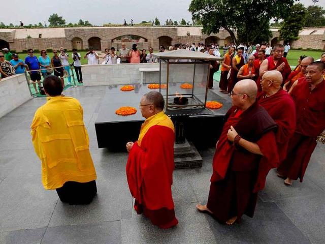 Tibetan monks during an inter-faith prayer meeting following Sunday's serial blasts at Bodhgaya temple. (PTI Photo)