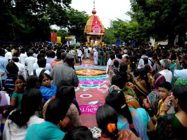 Indian devotees of The International Society of Krishna Conciousness (ISKON) participate in a ritual or 'puja' at the start of the Sri Jagannatha Ratha Yatra in Hyderabad on July 10, 2013. PTI