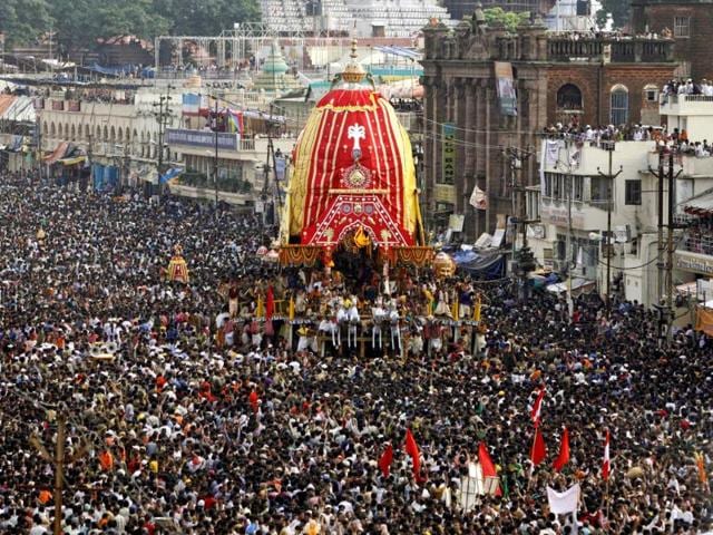 Devotees throng around the chariot of Lord Jagannath during the annual rath yatra or chariot procession in Puri, 60 kilometers (37 miles) from Bhubaneswar. (AP Photo)