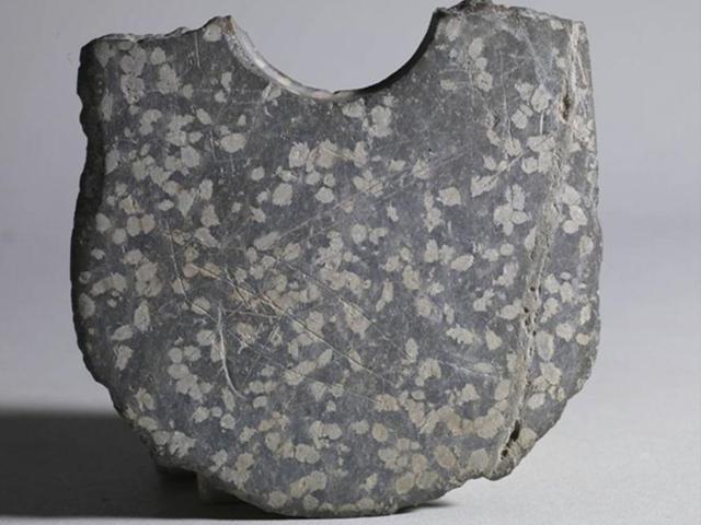 File-photo-of-markings-etched-on-an-unearthed-piece-of-a-stone-ax-are-seen-near-Zhuangqiao-grave-relic-in-Pinghu-in-eastern-China-s-Zhejiang-province-AP File-photo-of-markings-etched-on-an-unearthed-piece-of-a-stone-ax-are-seen-near-Zhuangqiao-grave-relic-in-Pinghu-in-eastern-China-s-Zhejiang-province-AP