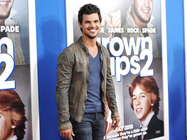 Actor Taylor Lautner attends the premiere of Grown Ups 2 at the AMC Loews Lincoln Square in New York. AP