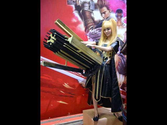 A cosplay fan poses on the opening day of the 9th China International Comics Games Expo (CCG Expo) in Shanghai. AFP Photo