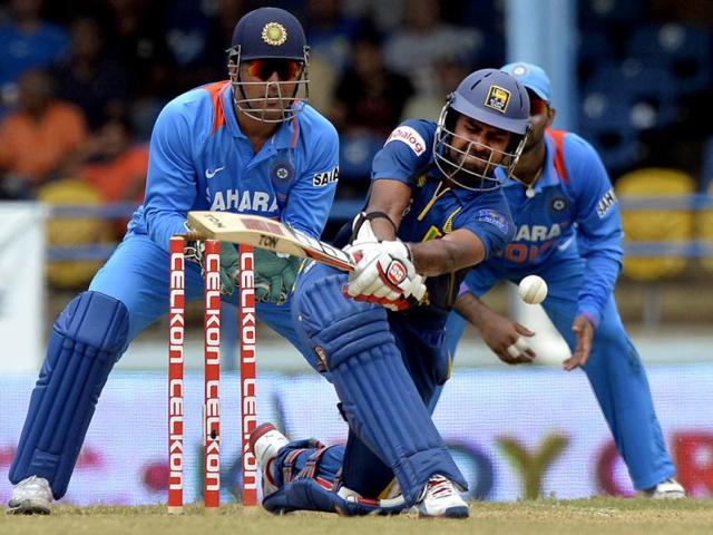 Sri Lankan Lahiru Thirimanne plays a shot during the final match of the Tri-Nation series between India and Sri Lanka at the Queen's Park Oval stadium in Port of Spain. AFP Photo/Jewel Samad
