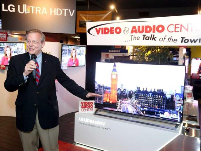 John I Taylor, vice president, LG Electronics USA, demonstrates the new 65-inch LG Ultra HDTV now on sale for the first time in Santa Monica, California. AP