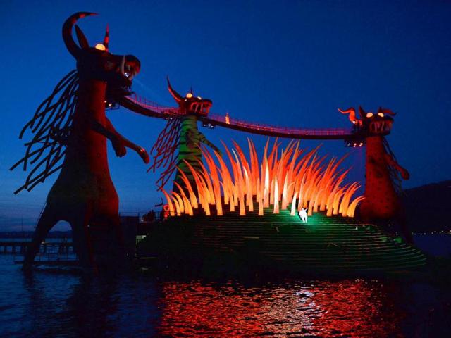 In this picture taken on July 12, 2013, Rainer Trost as Tamino performs on a giant futuristic stage built into Lake Constance in Bregenz, Austria, at a dress rehearsal of Mozart's opera 'The Magic Flute'. (AP Photo)
