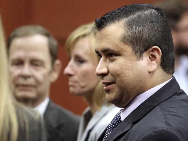 George Zimmerman leaves court with his family after Zimmerman's not guilty verdict in the Trayvon Martin shooting case was read in Seminole Circuit Court in Sanford, Florida. (AP Photo)