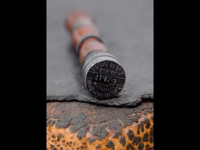 A round stamp used for stamping telegram forms is seen at the Central Telegraph Office in Mumbai. (AFP Photo)