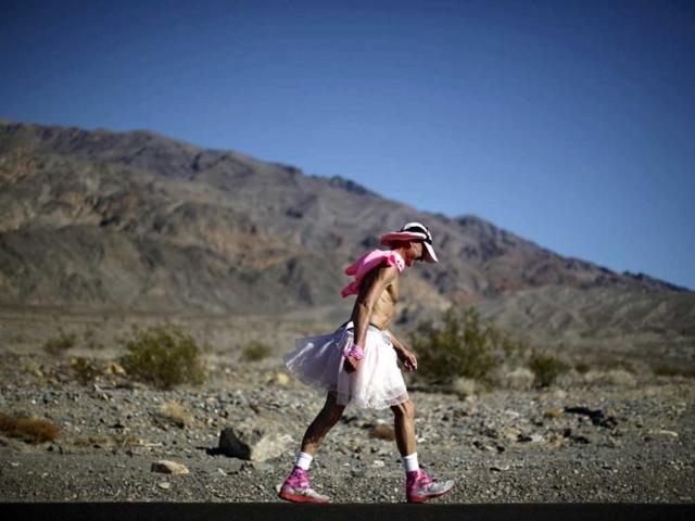 Keith Straw, 58, competes during the Badwater Ultramarathon in Death Valley National Park, California. The 135-mile (217 km) race, which bills itself as the world's toughest foot race, goes from Death Valley to Mt Whitney, California in temperatures which can reach 130 degrees Fahrenheit (55 Celsius). REUTERS/Lucy Nicholson Keith Straw, 58, competes during the Badwater Ultramarathon in Death Valley National Park, California. The 135-mile (217 km) race, which bills itself as the world's toughest foot race, goes from Death Valley to Mt Whitney, California in temperatures which can reach 130 degrees Fahrenheit (55 Celsius). REUTERS/Lucy Nicholson