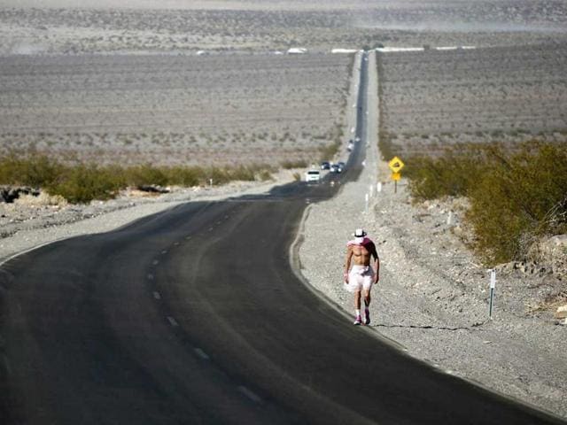 Keith Straw, 58, competes during the Badwater Ultramarathon in Death Valley National Park, California. The 135-mile (217 km) race, which bills itself as the world's toughest foot race, goes from Death Valley to Mt Whitney, California in temperatures which can reach 130 degrees Fahrenheit (55 Celsius). REUTERS/Lucy Nicholson Keith Straw, 58, competes during the Badwater Ultramarathon in Death Valley National Park, California. The 135-mile (217 km) race, which bills itself as the world's toughest foot race, goes from Death Valley to Mt Whitney, California in temperatures which can reach 130 degrees Fahrenheit (55 Celsius). REUTERS/Lucy Nicholson