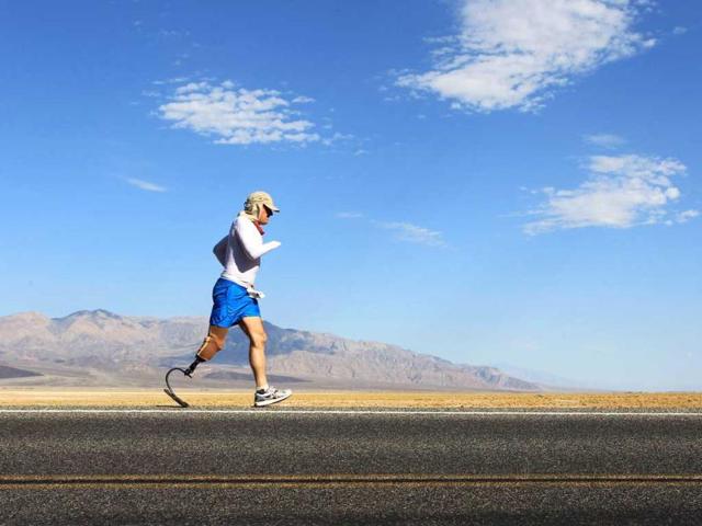 Double amputee Chris Moon of the UK runs in the AdventurCORPS Badwater 135 ultra-marathon race in Death Valley National Park, California. Billed as the toughest footrace in the world, the 36th annual Badwater 135 starts at Badwater Basin in Death Valley, 280 feet below sea level, where athletes begin a 135-mile non-stop run over three mountain ranges in extreme mid-summer desert heat to finish at 8,350 feet above sea level near Mount Whitney for a total cumulative vertical ascent of 13,000 feet. David McNew/Getty Images/AFP Double amputee Chris Moon of the UK runs in the AdventurCORPS Badwater 135 ultra-marathon race in Death Valley National Park, California. Billed as the toughest footrace in the world, the 36th annual Badwater 135 starts at Badwater Basin in Death Valley, 280 feet below sea level, where athletes begin a 135-mile non-stop run over three mountain ranges in extreme mid-summer desert heat to finish at 8,350 feet above sea level near Mount Whitney for a total cumulative vertical ascent of 13,000 feet. David McNew/Getty Images/AFP