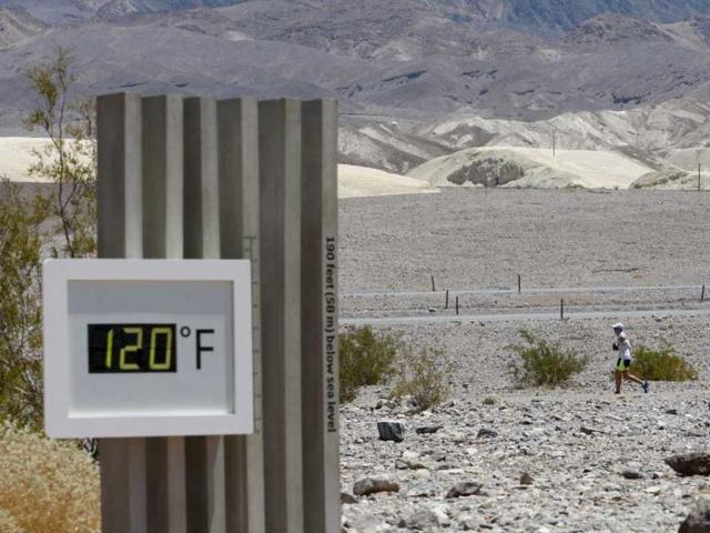 A competitor passes the unofficial thermometer at Furnace Creek Visitor Center during the AdventurCORPS Badwater 135 ultra-marathon race in Death Valley National Park, California. David McNew/Getty Images/AFP A competitor passes the unofficial thermometer at Furnace Creek Visitor Center during the AdventurCORPS Badwater 135 ultra-marathon race in Death Valley National Park, California. David McNew/Getty Images/AFP