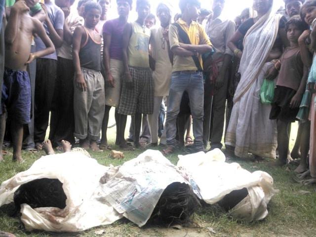 Bodies of the children, who died in Chhapra after consuming contaminated mid-day meals, lying on ground. (HT Photo)