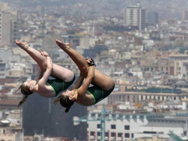 Australia's Emily Boyd, left, and Lara Tarvit perform during a 10-meter platform diving training session ahead of the FINA Swimming World Championships in Barcelona, Spain. AP Photo