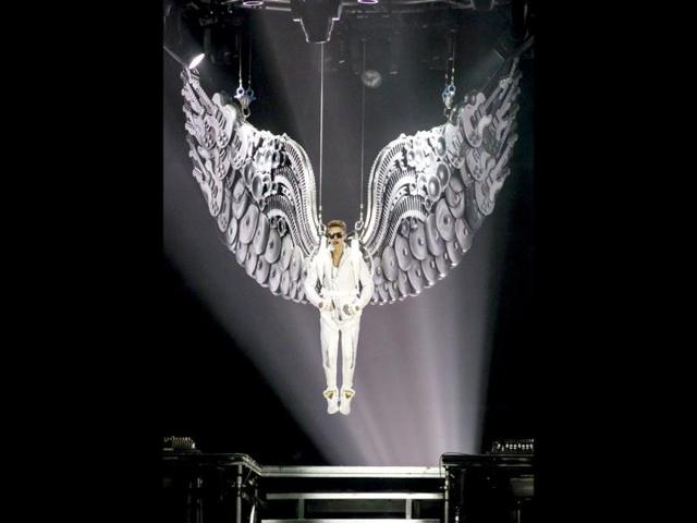 Justin Bieber is lowered onto the stage during a concert at the Wells Fargo Center on Wednesday, July 17, 2013 in Philadelphia. AP