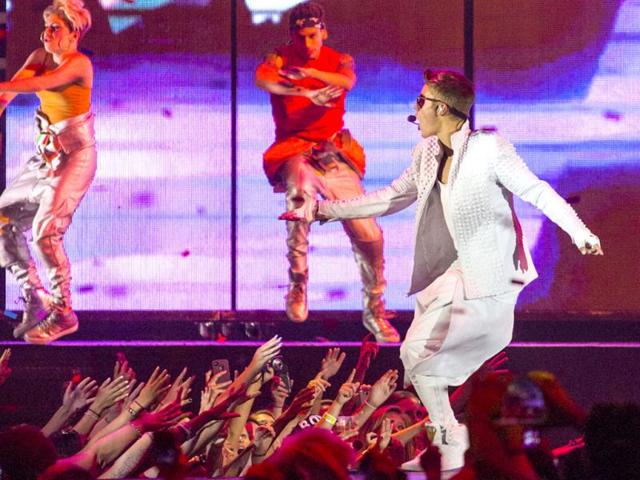 Justin Bieber performs in a concert at the Wells Fargo Center on Wednesday, July 17, 2013 in Philadelphia. AP