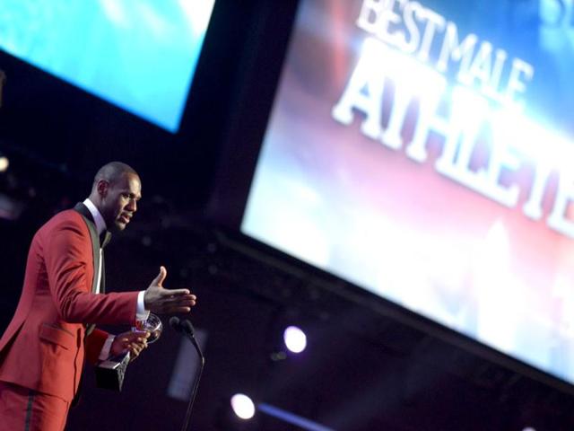 LeBron James accepts the best male athlete award at the ESPY Awards on Wednesday, July 17, 2013, at the Nokia Theater in Los Angeles. AP