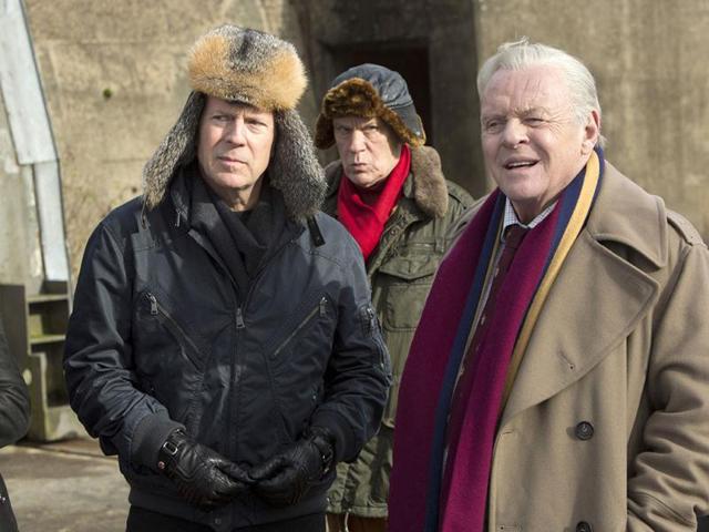 The film stars Bruce Willis (left) in the lead, along with John Malkovich (behind) and Anthony Hopkins.