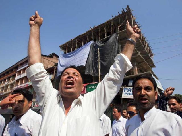 Kashmiri lawyers shout slogans during a protest against the killing of villagers by Border Security Forces in Srinagar. (AP Photo)