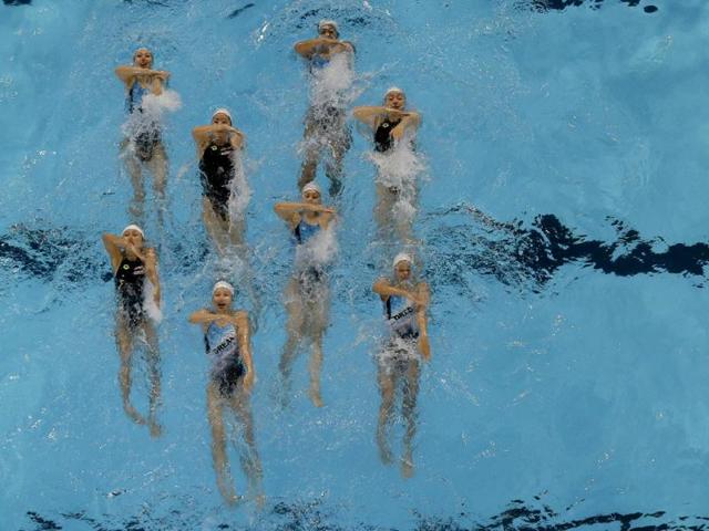 Japan's synchronized swim team perform their routine during a training session ahead of the FINA Swimming World Championships in Barcelona, Spain. (AP Photo)