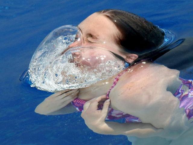 An unidentified 3-meter springboard diver leaves the pool during a training session ahead of the FINA Swimming World Championships in Barcelona, Spain. (AP Photo)