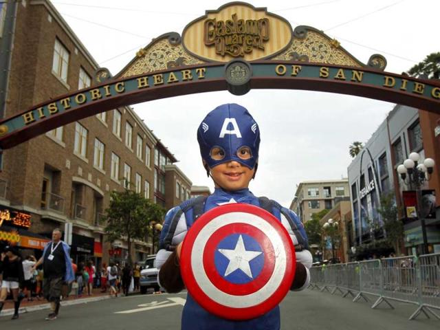 Atticus Khan poses for a photo dressed as Captain America at Comic Con in San Diego. (AP Photo)