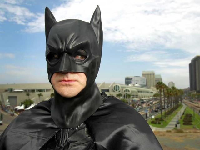 Ted Rotunda poses for a photo dressed as Batman, at Comic Con, in San Diego. (AP Photo)