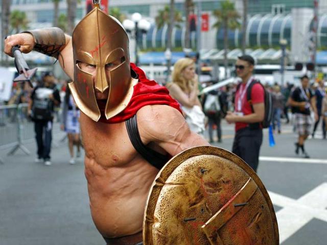 Todd Schmidt, dressed as a Spartan, poses for a photo during Comic Con in San Diego. (AP Photo)