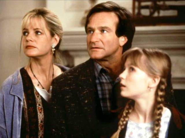 Williams with on-screen family in hit fantasy-thriller Jumanji.