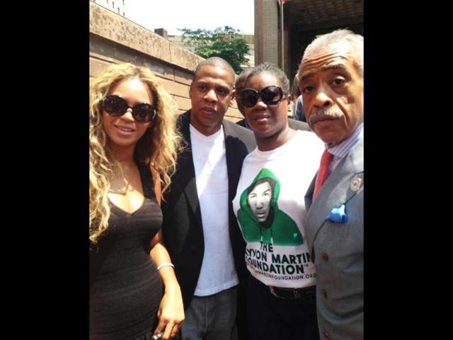 Beyonce (L) and Jay-Z (second left) join Trayvon Martin’s mother Sybrina Fulton (second right) and reverend Al Sharpton at the "Justice for Travon" vigil in New York. (AP Photo/Noerdlinger Media)