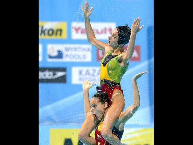 The Italian team perform their routine in the synchronised swimming free combined event at the FINA Swimming World Championships in Barcelona, Spain.(AP Photo)