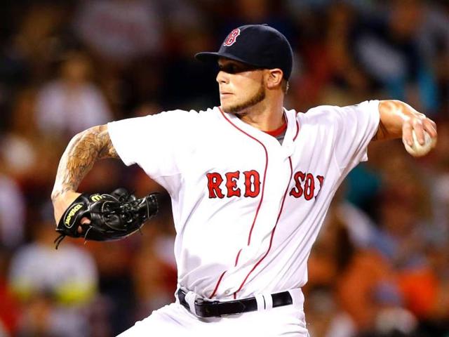 Drake Britton #66 of the Boston Red Sox pitches against the New York Yankees during the game at Fenway Park in Boston, Massachusetts. AFP photo