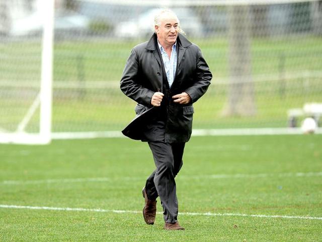 Liverpool football legend Craig Johnston leaves the grounds after talking to Melbourne Victory players at Gosch’s Paddock in Melbourne. AFP