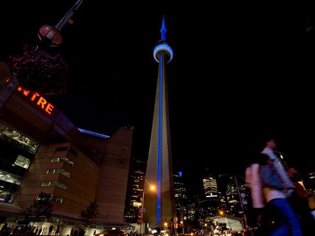 The CN Tower is lighted blue to celebrate the birth of the royal baby in Toronto. AP Photo
