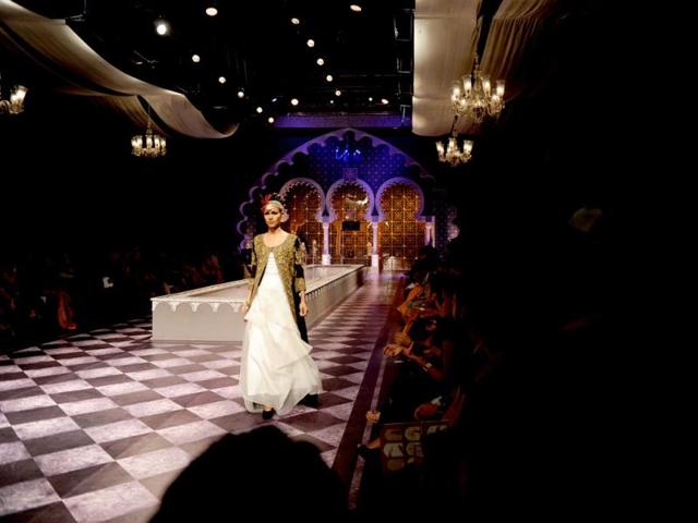 A model presents a creation by Raghavendra Rathore during the Indian Bridal Fashion Week in New Delhi. (AFP Photo)