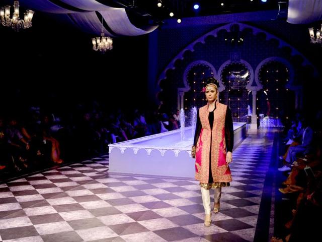 A model presents a creation by Raghavendra Rathore during the Indian Bridal Fashion Week in New Delhi. (AFP Photo)
