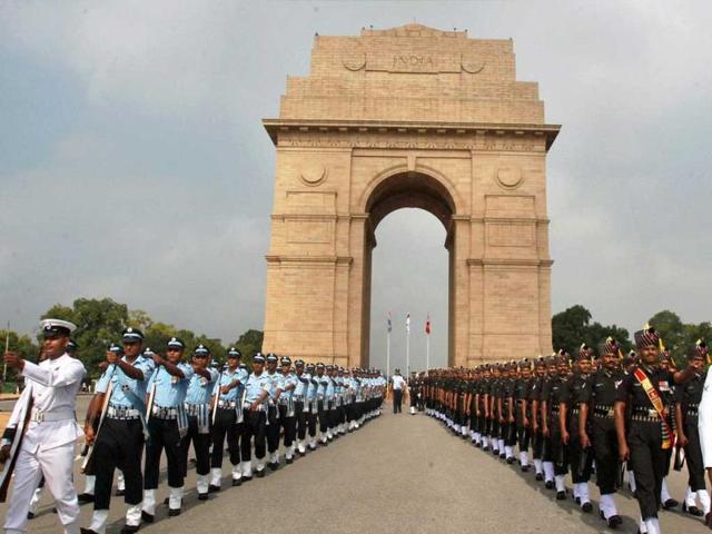 Inter-Services personnel march near Amar Jawan Jyoti at India Gate during a ceremony to pay homage to Kargil war martyrs on the occasion of Vijay Diwas in New Delhi. (PTI Photo)