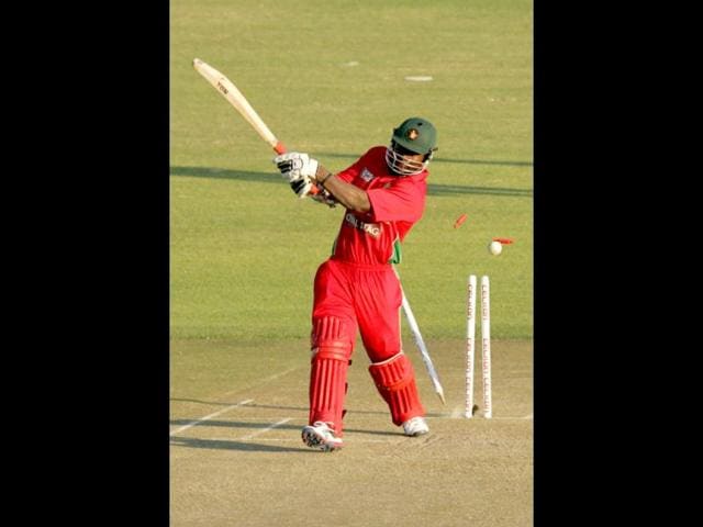 Zimbabwe's Brian Vitori is clean bowled during the second ODI against India at the Harare Sports Club in Harare. (AFP Photo)