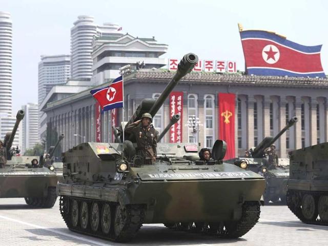 Tanks march past the Kim Il Sung Square in a painstakingly choreographed military parade to celebrate the 60th anniversary of the Korean War. (AP Photo)