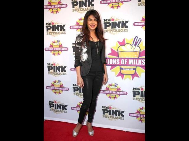 At the red carpet. Priyanka Chopra arrives to launch her 'Exotic' milkshake by the Mr Pink Beverages.