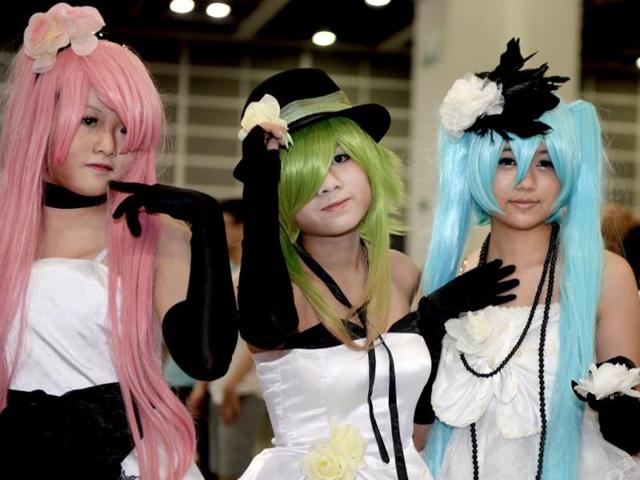 Particpants wear fancy costumes for the costume play event at the 15th Ani-Com and Games Fair in Hong Kong. (AFP PHOTO)