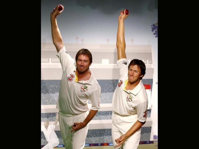 Former Australian cricket player fast bowler Glenn McGrath (L) poses for a picture next to his wax figure during a publicity event at Madame Tussauds wax museum in central Sydney. (Reuters Photo)