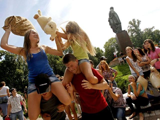 Youths fight with pillows during a flash mob in a park in central Kiev. Some 100 people participated in a social media flash mob called Pillow Fight. Reuters photo