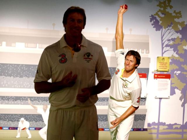 Former Australian cricket player fast bowler Glenn McGrath (L) poses for a picture in front of his wax figure during a publicity event at Madame Tussauds wax museum in Sydney. (Reuters Photo)