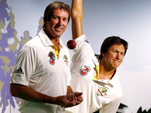 Former Australian cricket player fast bowler Glenn McGrath (L) poses for a picture next to his wax figure during a publicity event at Madame Tussauds wax museum in Sydney. (Reuters Photo)